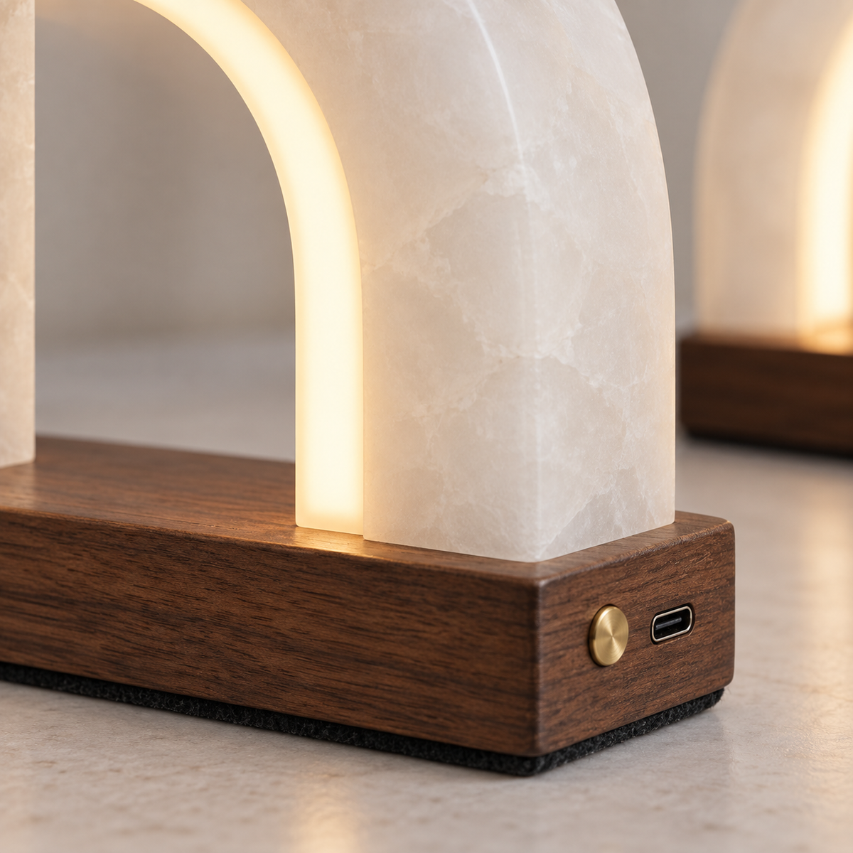 Glowvault Illuminated Arch Bookends - detail walnut base USB-C and brass dimmer